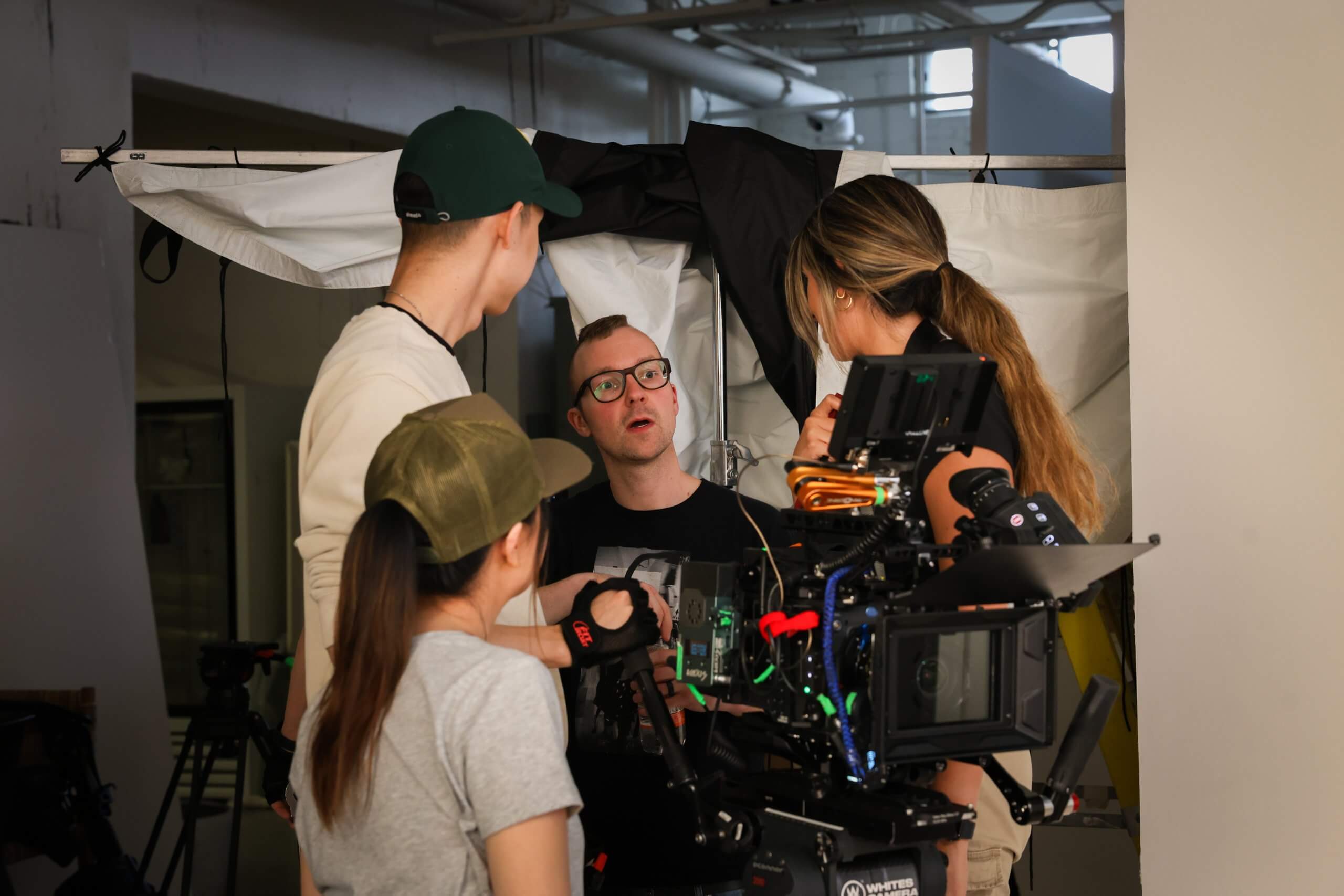 Crew reviewing a shot on set