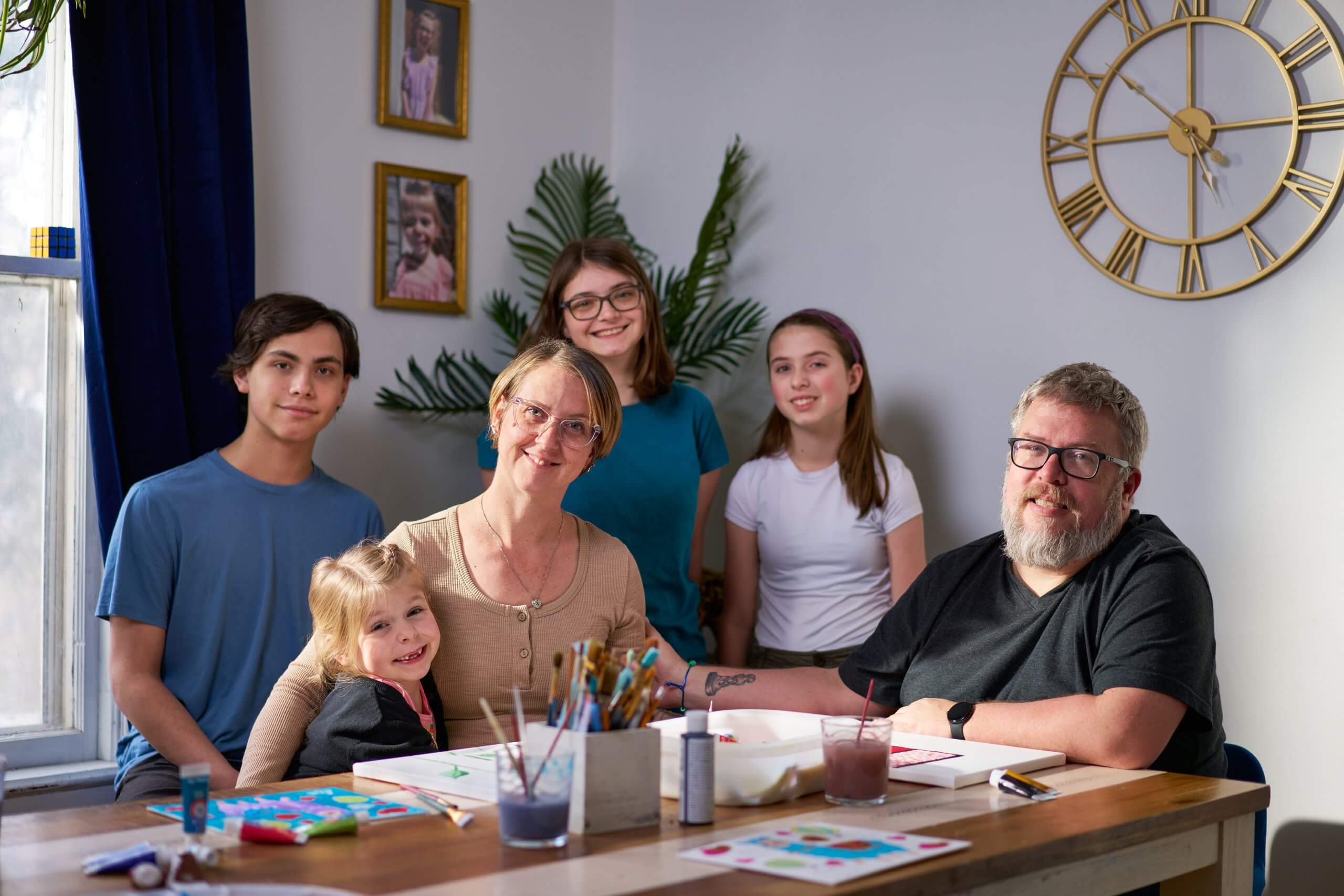 Family portrait at a dining table
